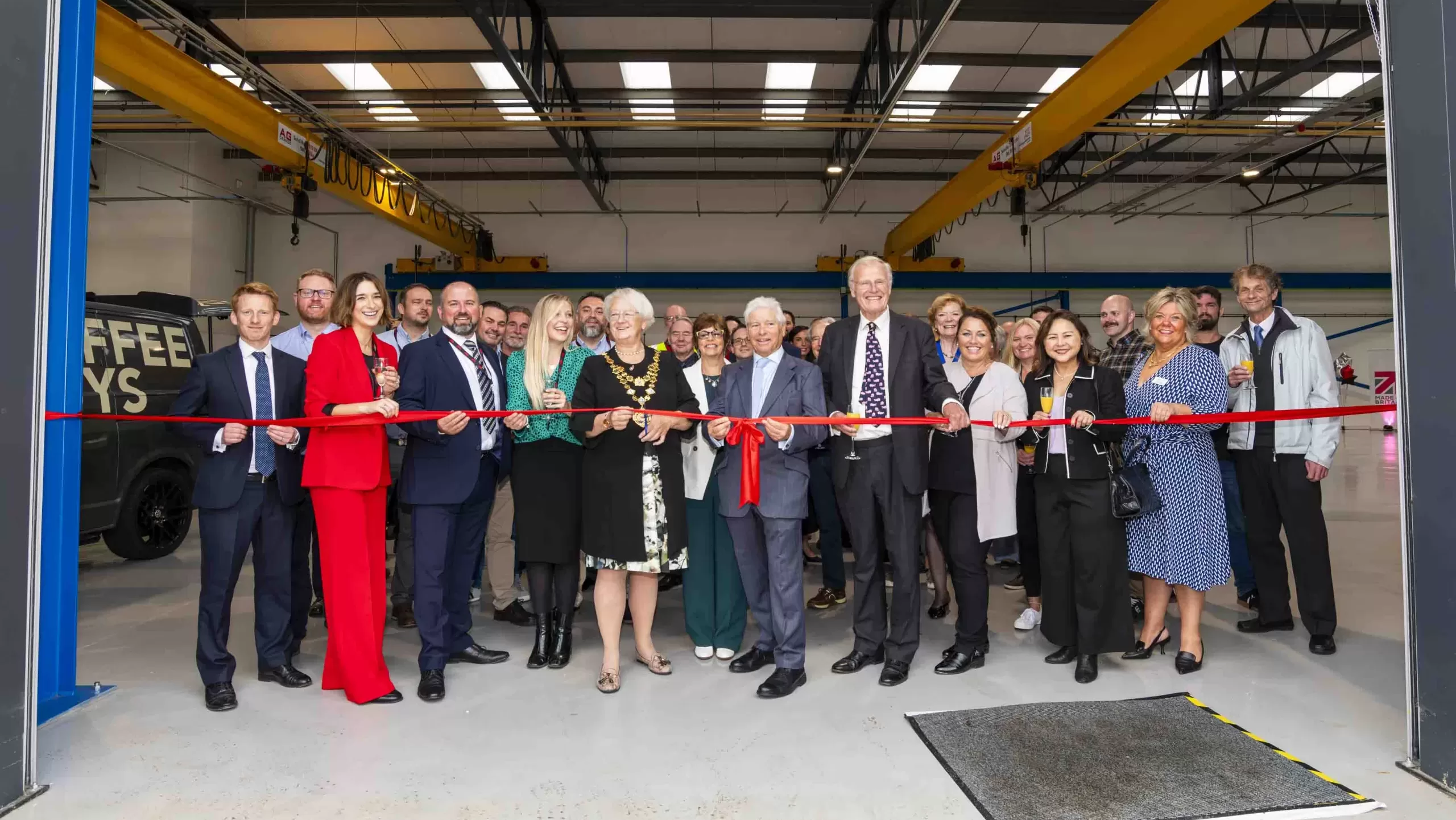 ribbon cut manufacturing facility